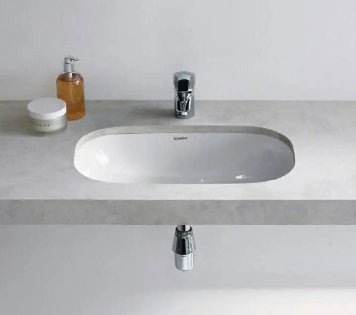 Undercounter washbasin with chrome tap